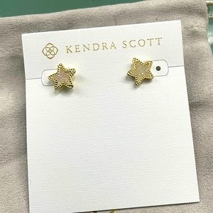 Kendra Scott gold/ white star pierced earrings.